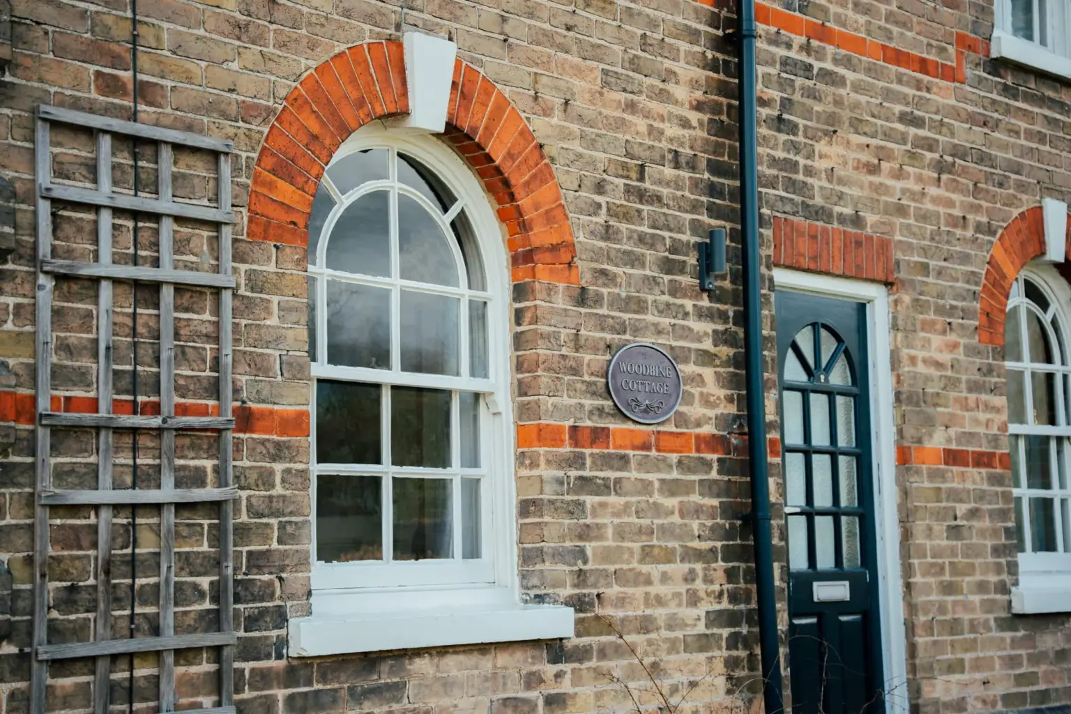 Close up of lower arched sliding sash window